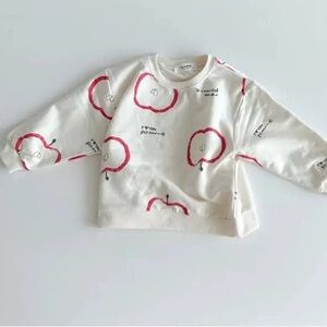White sweatshirt apple print